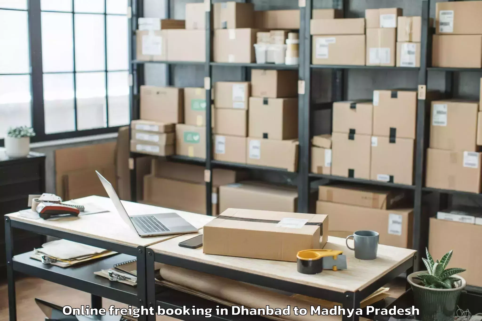 Quality Dhanbad to Maharajpur Online Freight Booking